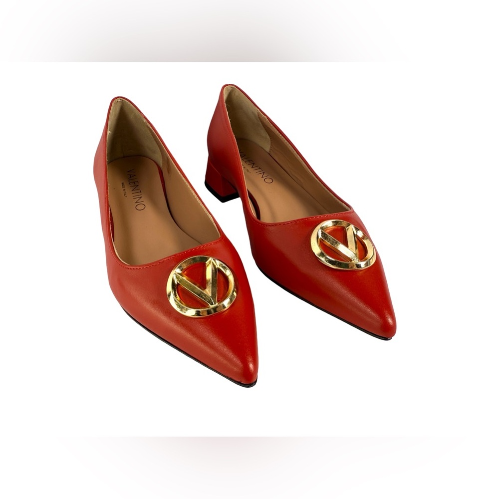 Valentino by Mario Valentino Perla VLogo leather pump with a low block heel.